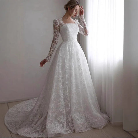 Embroidered Long Sleeve Trailing Wedding Dress